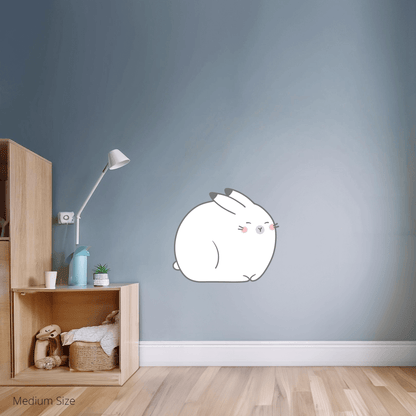 Anse the Arctic Hare wall sticker applied on a child’s bedroom wall – medium size, showing placement in kids’ room