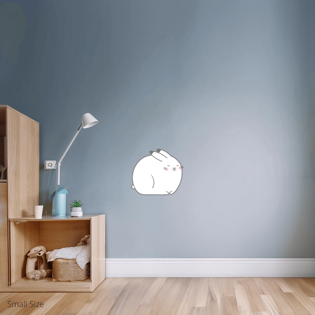 Anse the Arctic Hare wall sticker applied on a child’s bedroom wall – small size, showing placement in kids’ room