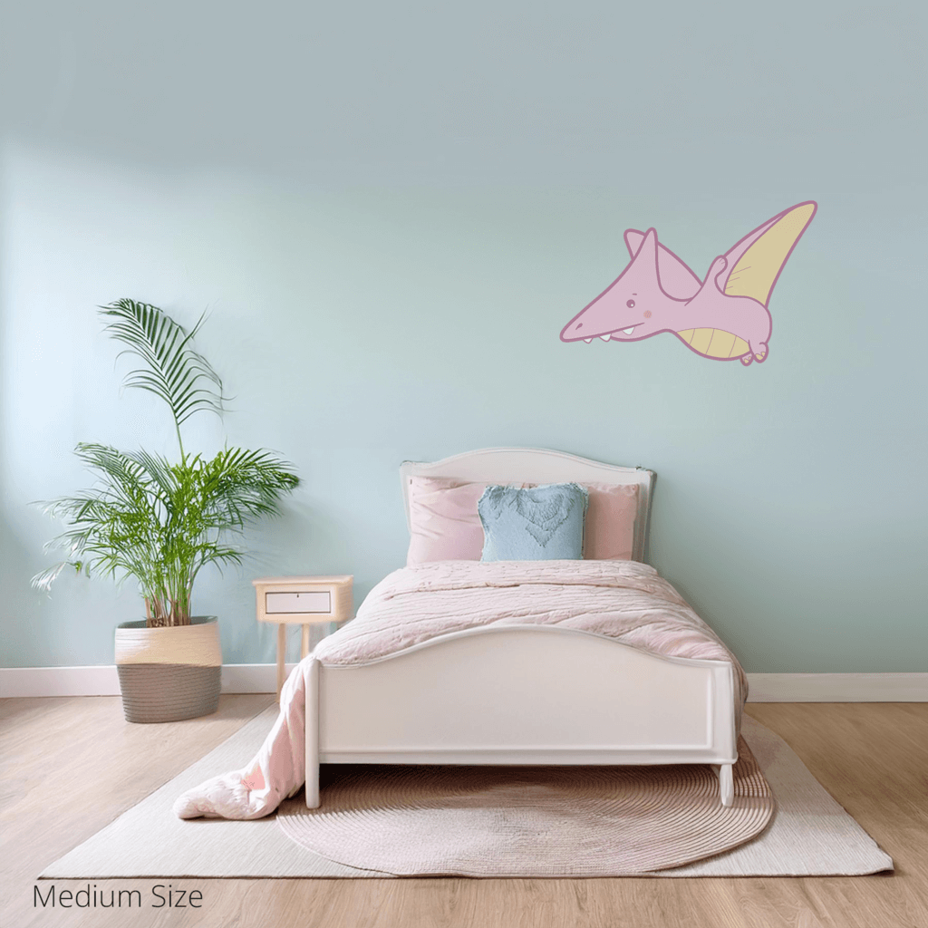 Petra the Pterodactyl wall sticker applied on a child’s bedroom wall – medium size, showing placement in kids’ room