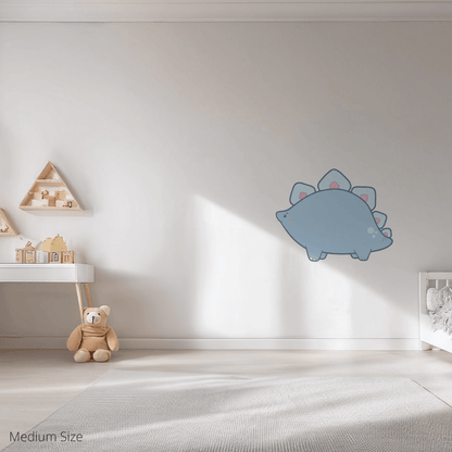 Shelby the Stegasaurus wall sticker applied on a child’s bedroom wall – medium size, showing placement in kids’ room