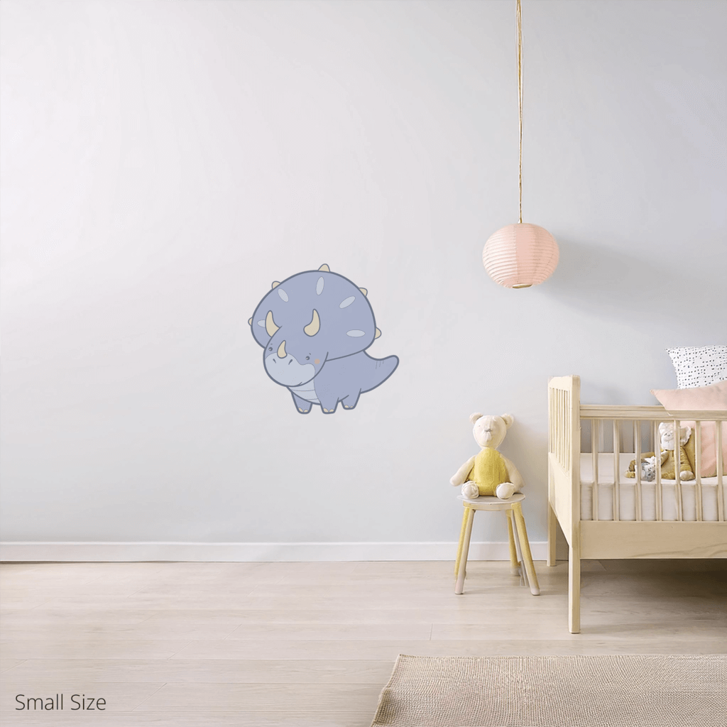 Tracy the Triceratops wall sticker applied on a child’s bedroom wall – small size, showing placement in kids’ room
